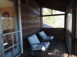 French doors lead to Screened in Deck with Long Range view with chairs